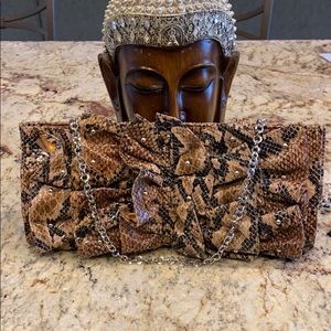 Rampage animal print ruffle clutch